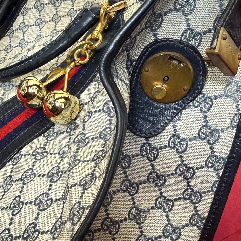 Gucci Beige and Blue Travel Bag with Gold Accents vintage